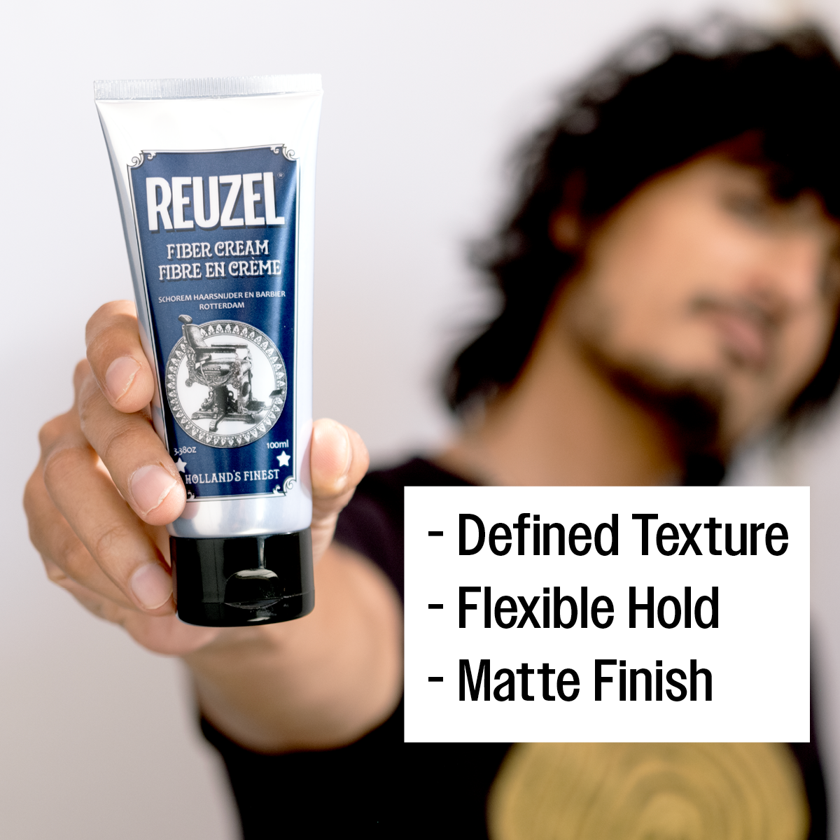 Reuzel UK Fiber Cream in a jar, providing textured hold and natural finish for hairstyling.