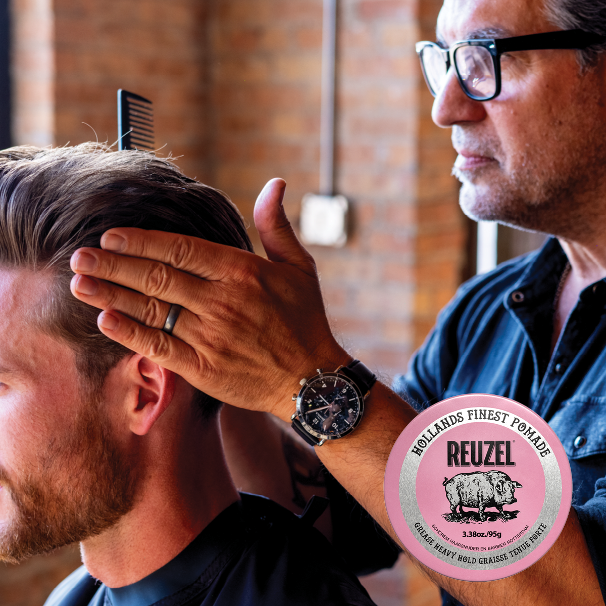 Reuzel Pink Pomade jar with label, bright pink lid, and product name visible, ideal for styling men's hair.