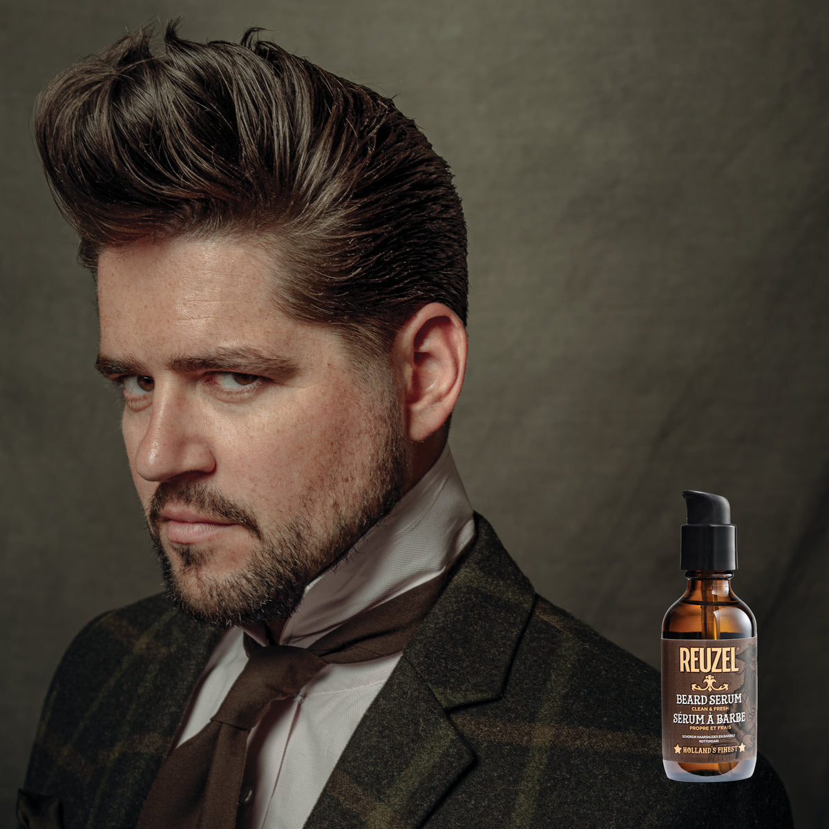 Reuzel UK Clean & Fresh beard serum bottle with label, shown on a plain background.