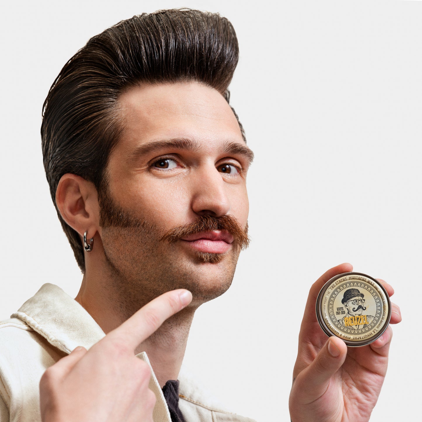 Reuzel "The Stache" mustache wax in a small jar, designed for shaping and styling mustaches, UK REUZEL beard product.