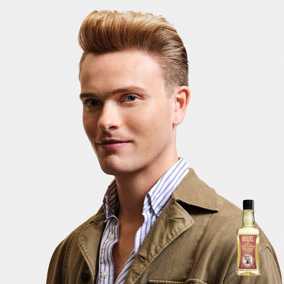 Reuzel UK daily shampoo and conditioner bundle with sleek bottles, ideal for daily hair care and scalp nourishment.