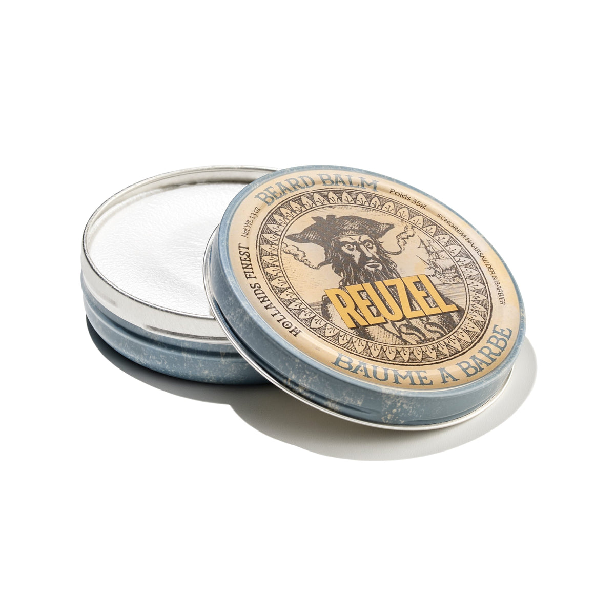 Reuzel UK beard balm jar with label, showing smooth beard grooming product for styling and conditioning facial hair.