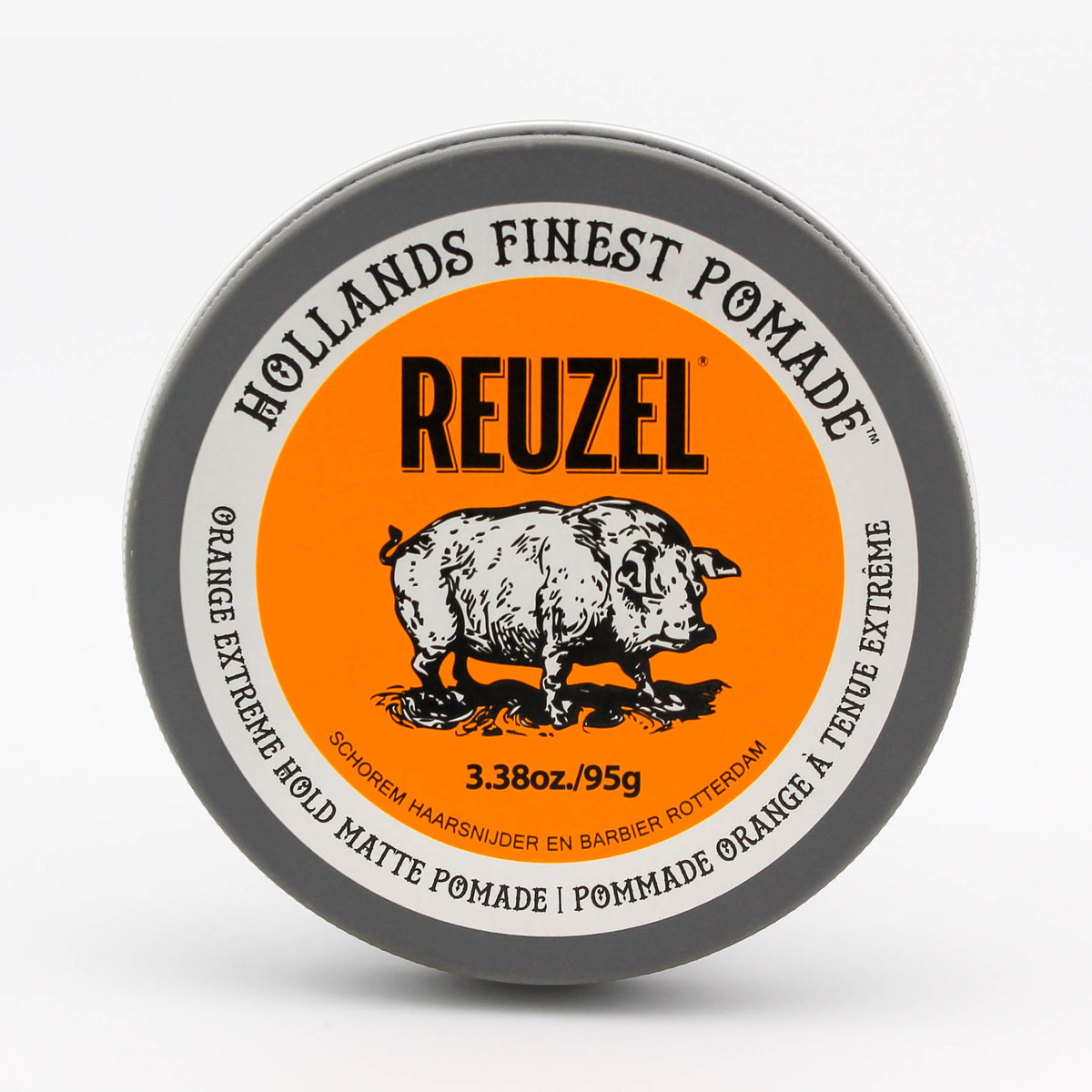 A round tin of Reuzel Holland's Finest Pomade in Orange Extreme, featuring a bright orange label with a black pig illustration and gray outer rim on a white background.