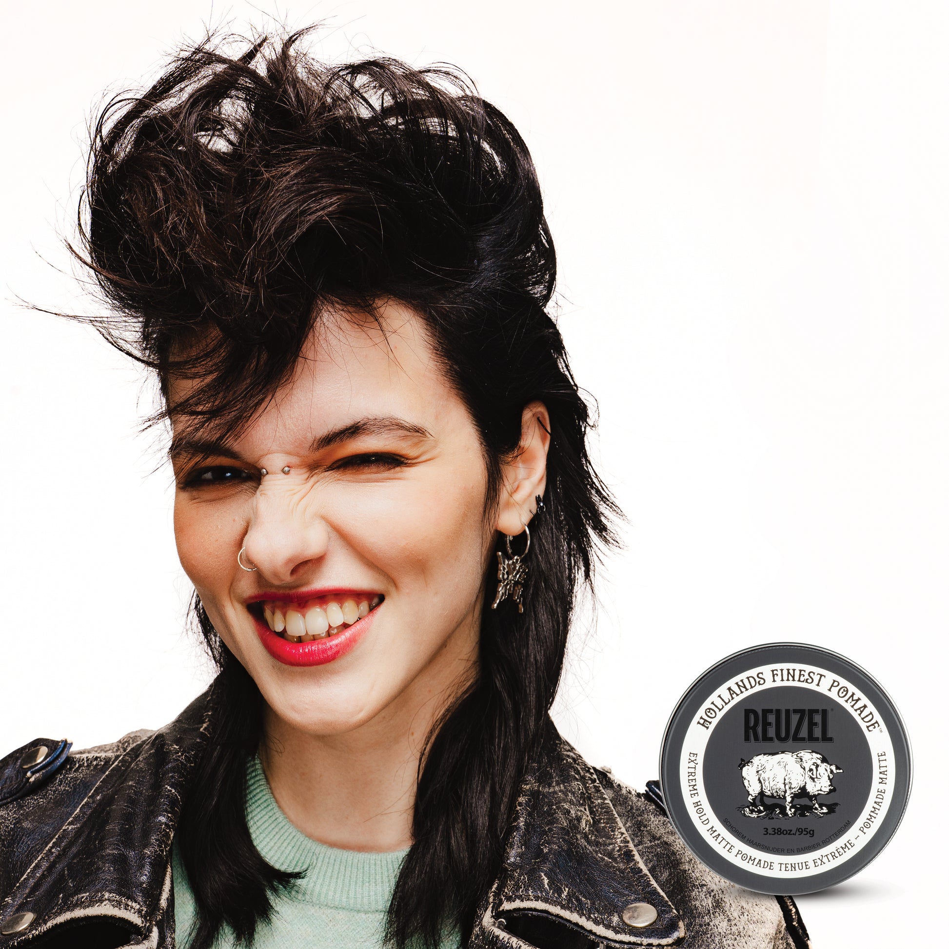 Reuzel UK Extreme Hold Matte Pomade jar with black lid and label, showing product name and branding on the container.