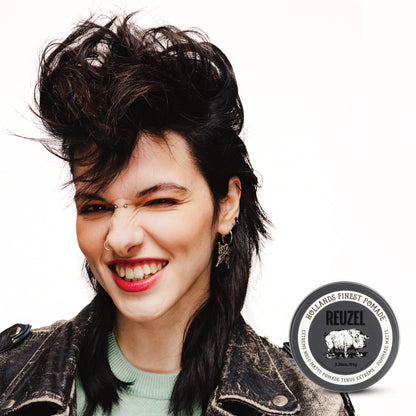 Reuzel UK Extreme Hold Matte Pomade jar with black lid and label, showing product name and branding on the container.