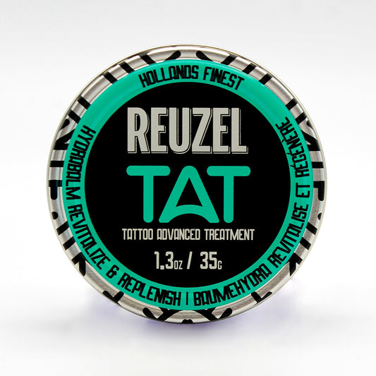 REUZEL UK TAT HYDRABALM tattoo aftercare balm in a white jar, designed for soothing and moisturizing fresh tattoos.