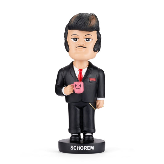 Reuzel Schorem Harry Bobblehead in black suit and red tie with pompadour hairstyle, front view with Schorem lettering on base